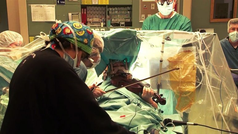 neuromorphogenesis:  Violinist Plays Mozart Through Her Own Brain Surgery Violinist