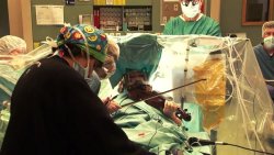 Neuromorphogenesis:  Violinist Plays Mozart Through Her Own Brain Surgery Violinist