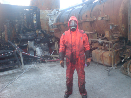 worklad12:Scrap dismantler in a snap yard. Encased in his uniform and wearing his mask all shift on 