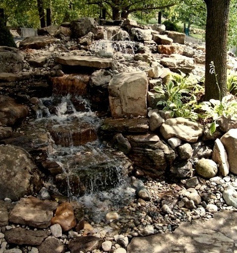 Tropical Landscape - Gravel Inspiration For A Mid-sized Tropical Shade Front Yard Gravel Water Fountain