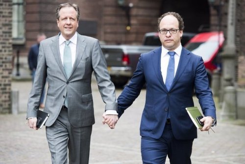 gaywrites:  Here is something: After two men in the Netherlands were attacked while walking home from a party holding hands, straight Dutch politicians everywhere are showing their solidarity by walking around holding hands. The top photo is of Dutch