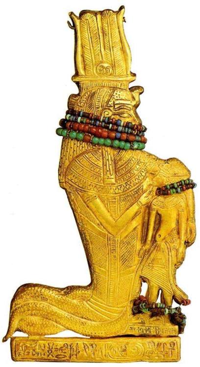 grandegyptianmuseum:Werethekau nursing Tutankhamun, gold amulet from the Tomb of Tutankhamun. Now in