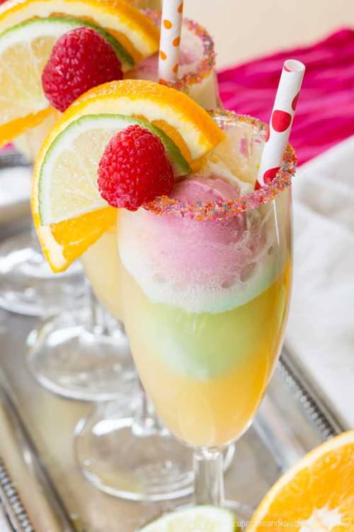 DIY Rainbow Sherbet Sparkling Cider FloatsColorful scoops of sherbet float around in a bubbly glass 