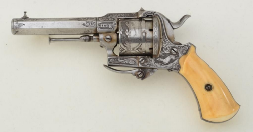 An engraved Lefaucheux pinfire revolver with folding trigger and ivory grips.  Belgian proof marks, 