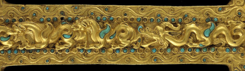 Treasures of Tillia Tepe, Afghanistan. 1. Sleeve decorated with a scene of animals in combat.2. Hand