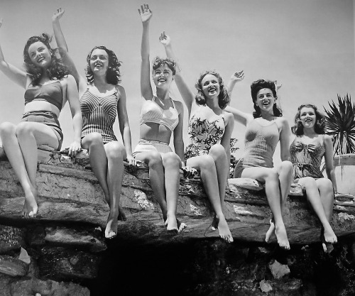 Vintage girls in vintage swimsuits vintage waving…