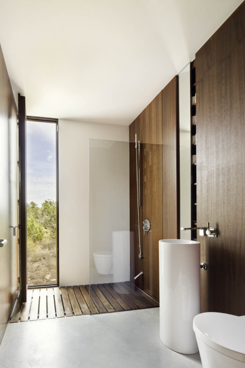 {Minimalist with some cute details… love the ladder thing in the dressing room/hall… a
