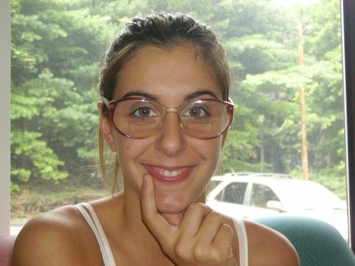 Long sighted girl wearing bifocal glasses