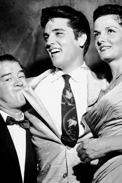 vinceveretts:  Elvis Presley with Lou Costello and actress Jane Russell at Danny Thomas’ Shower of Stars to benefit St. Jude’s Hospital at Russwood Park in Memphis, June 28, 1957.  © Barney Sellers 