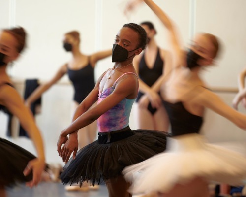 ashton edwards photographed rehearsing and preparing to perform as a swan in swan lake, for the ny t
