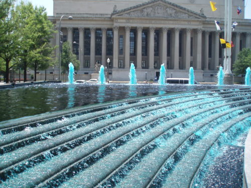 Naval Memorial Fountain With Water Dyed Blue, National Archives Building in Background, Washington, 