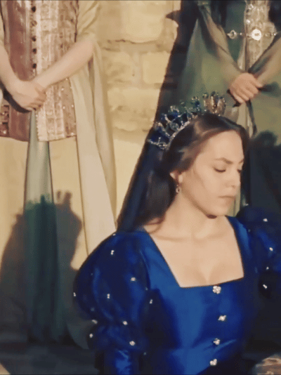 Sultans And Their Colorful Clothes + Dilruba Sultan Is Wearing A Dark Blue Caftan, Yellow Buttons And