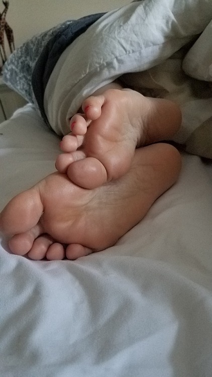 My pretty wifes beautiful,soft sleeping soles.please comment