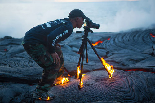 dzngerous:  19withbonyknees:  National Geographic photographers are metal as fuck  sir your feet are casually on fucking fire