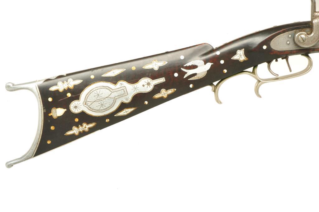 peashooter85:  A silver mounted percussion rifle crafted by M. M. Benson, mid 19th