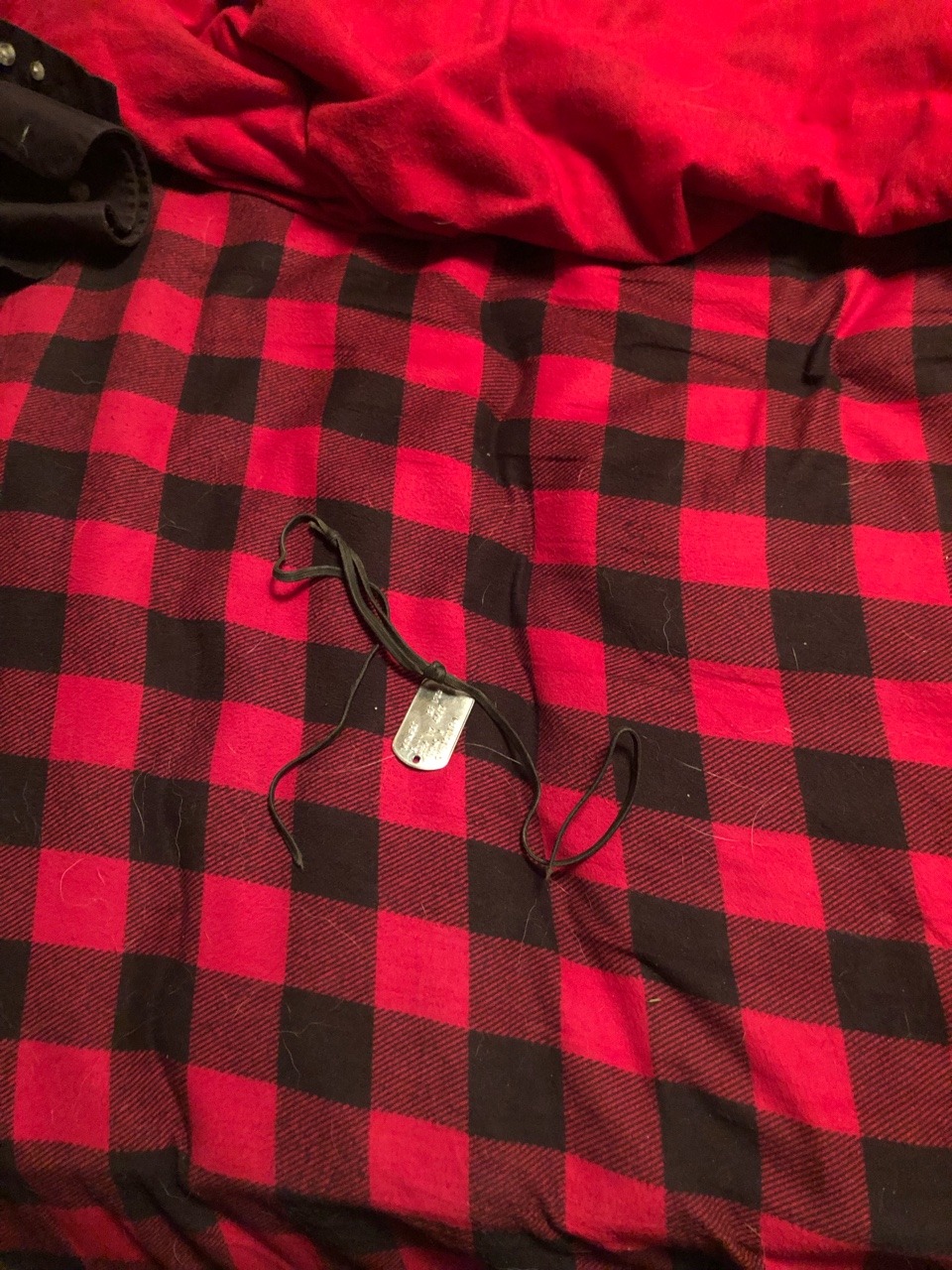 Well, after twelve years of wearing it everyday and holding on by mere threads the