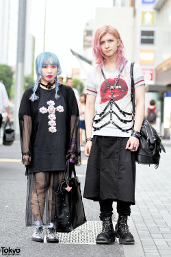 tokyo-fashion:  Cindy and Franky - the designers of Devil666ish - on the street in Harajuku wearing an eyeball bracelet, leather harness, feather bag, kanji choker, and other Devlish items. They’re also both wearing Vivienne Westwood and Cindy is wearing