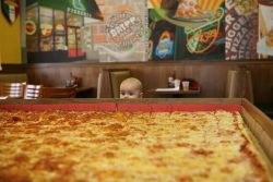 tailorofjoy:  A picture of a baby overwhelmed by pizza 