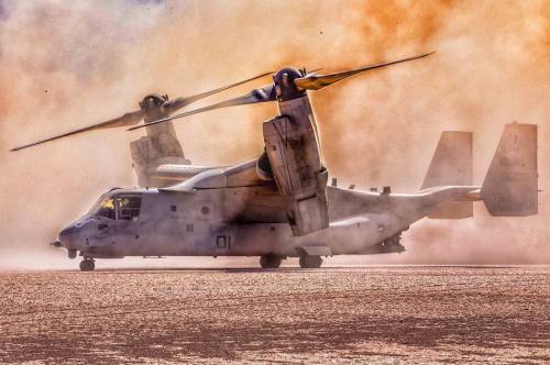 wolvesden: globalairforce: A U.S. Marine Corps MV-22 Osprey prepares to lower its ramp during a nonc