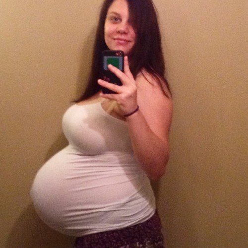 deliciouslyimpregnated:zaloog81:  pregnantmaxim:  Twinsies  She is so big. Incredibly sexy  God I wa