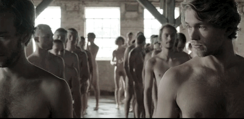 notdbd:Scenes from the Danish TV series 1864, starring Jens Sætter-Lassen and Jakob Oftebro. Young men line up nude for their military medical exams, and a joyful lad celebrates by standing over the sea naked. 
