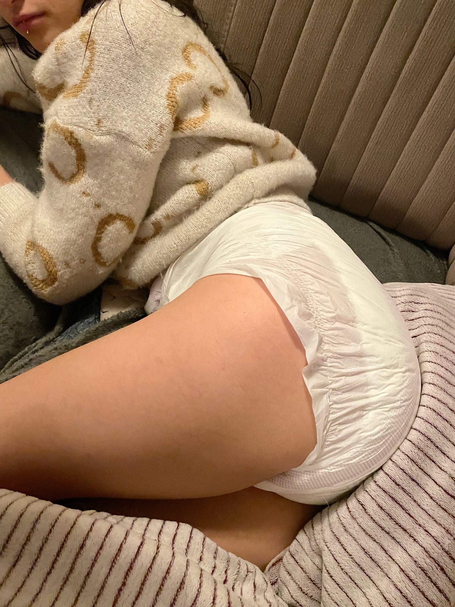 diapergirlmilla:A good thick diaper on. No underwear. The only right way to sit on the couch at night don’t you think? 😍