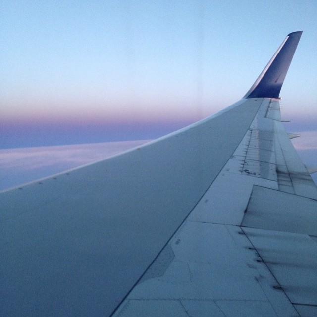 Yes I know. A cliché picture of the airplane wing hut I had to. Sunset flying over
