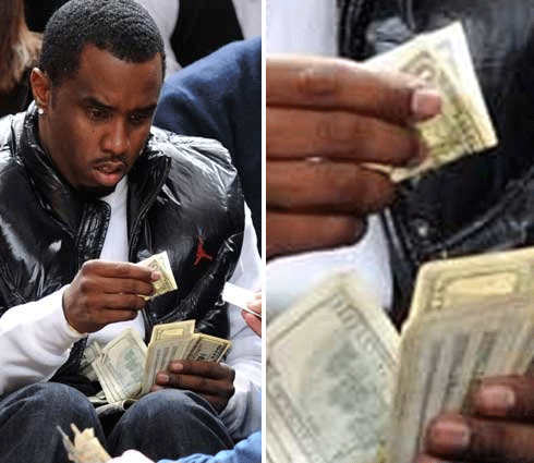 thesnobbyartsyblog: thesnobbyartsyblog:  The most inspiring picture I ever saw was when Diddy was at the Knicks game with a bunch of money on his lap and he’s holding a dollar bill like “Wtf is this?” I love that picture so much. It’s the most