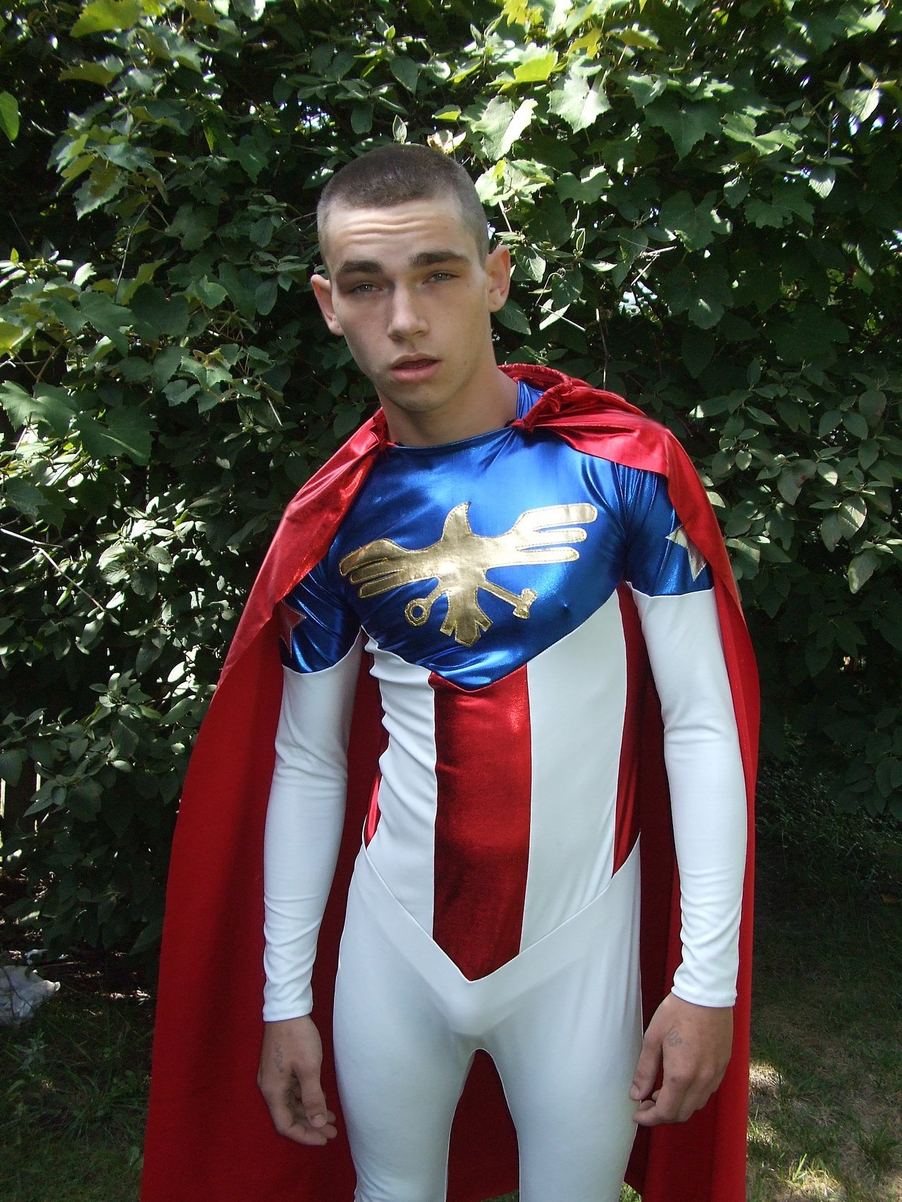 Patriotic young American superhero confronted by a hypno-villain and is reduced to