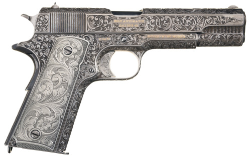 An early production US Colt Government Model semi automatic pistol engraved by Richard Roy. 