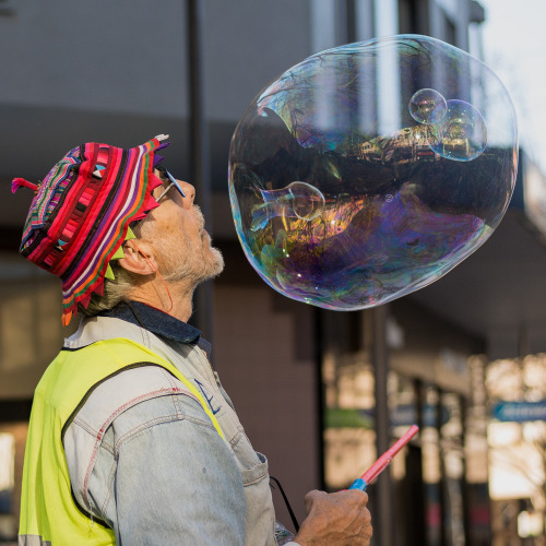 Known only as the Bubble Man - a street performer providing free entertainment in Canberra’s city ce