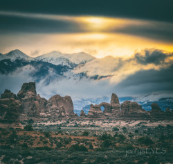 “God Light”Arches National Park, sunriselooking east towards the Windows Section (Turrent Arch is visible), with the LaSal Mountains in the background