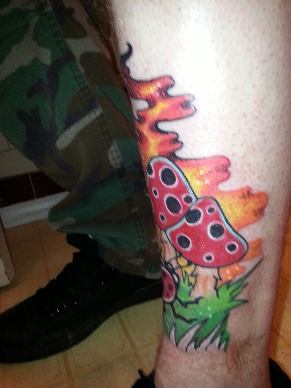 My new tattoo I got tonight..  always wanted some mushrooms and the ladybug is for
