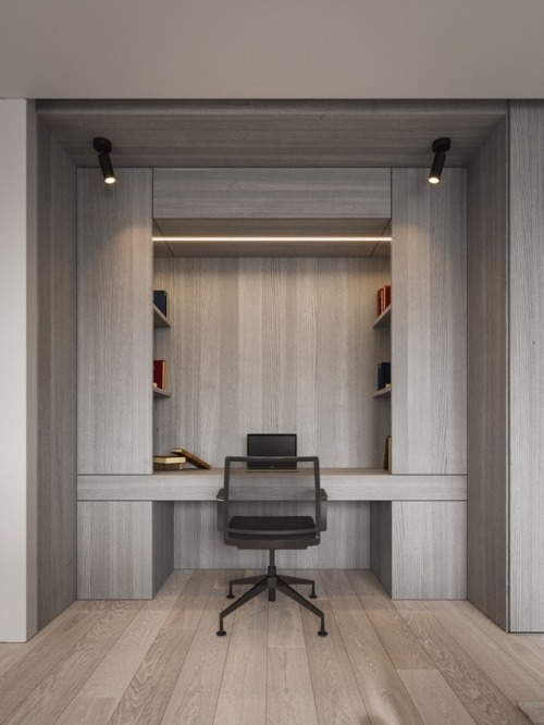 Directional spotlights illuminate this integrated desk by Interior designer, Kanstantsin Remez.