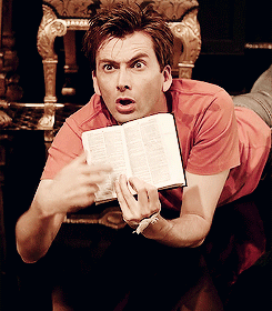 everybodyreadingbooks:lumos5000:In which David Tennant demonstrates the proper way to read a book.Fa