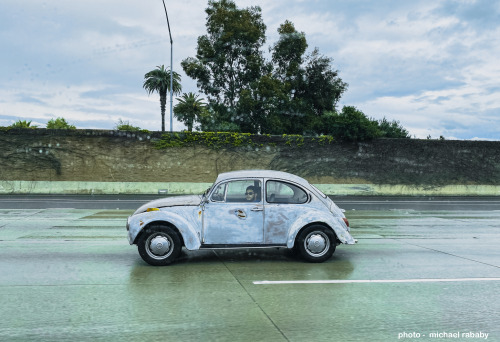 vw bug on freeway, southern califiornia.