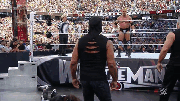 rockbottomradio:  Hulk Hogan doing the suck it gesture at Triple H at Wrestlemania