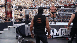 rockbottomradio:  Hulk Hogan doing the suck it gesture at Triple H at Wrestlemania 31