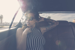 vanstyles:  Madzilla smoking in the backseat of my car.  