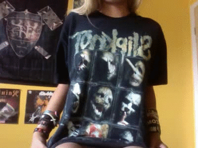 diary-ofametalhead:  in my old, barely used band shirt because i really need to do