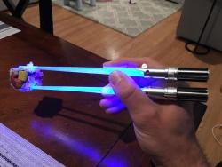 novelty-gift-ideas:Star Wars Lightsaber Chopsticks     This