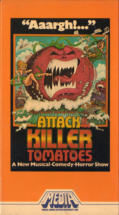 vhscoverjunkie:Attack of the Killer Tomatoes (1978)Once upon a time we had a Yankee Swap at work for