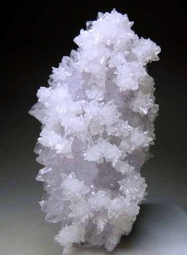 mineralists:  Light Lavender pink Amethyst partially covered with colorless star