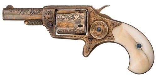 Engraved and gold plated Colt New Line pocket revolver with ivory grips, produced in 1875.from Rock 