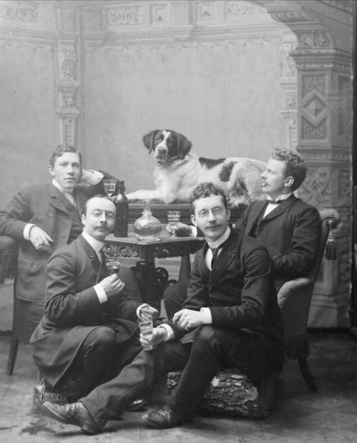 vintagenorway:Gentlemen sitting around a table with dog