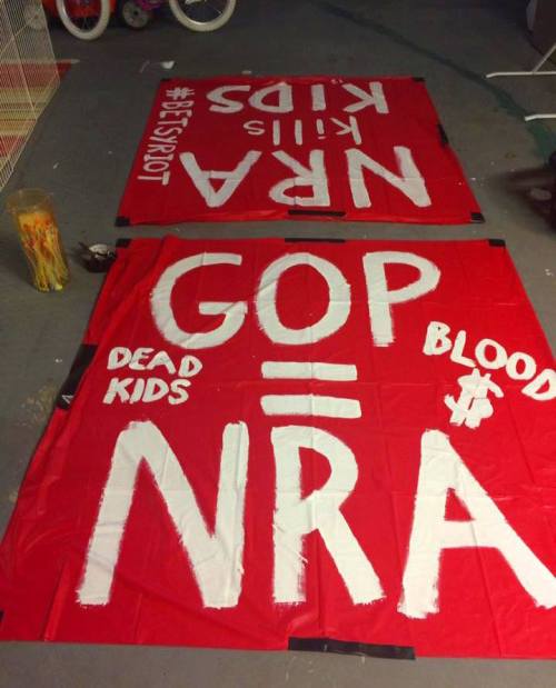 A riot of betsies took to the streets of San Diego overnight and hung up ten NRA-fucking banners, in