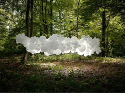 culturenlifestyle: Ethereal Cloud Installations Grace Different Sceneries Photographer Charles Petillon captures the beauty of clustered  balloons left alone to disrupt the scenic landscapes that surround them in a series of photographs.  Keep reading