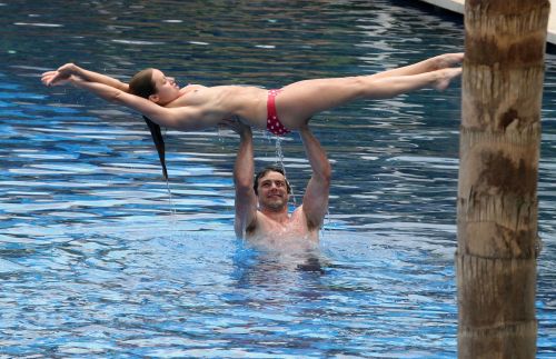 toplessbeachcelebs:  Una Healy (Singer) swimming topless at a resort in Spain (July 2010)