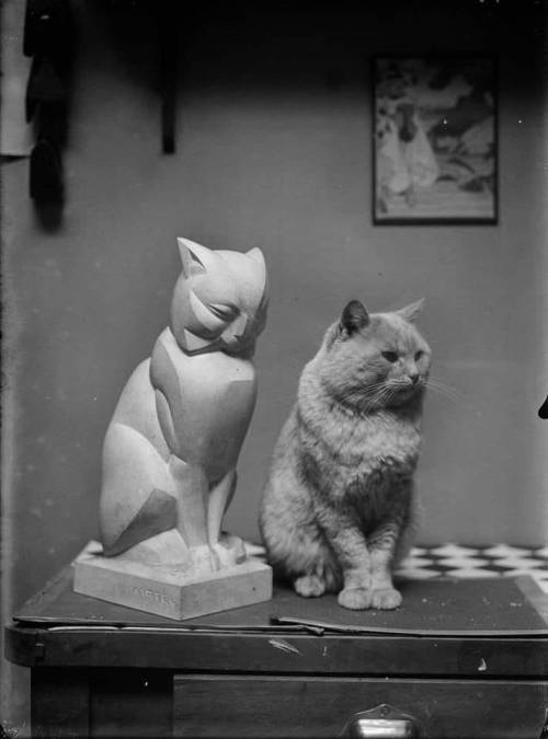 paolo-streito-1264:Therese Bonney. Cat, Sculpture By Jan & Joël Martel, & His Model, 1926.