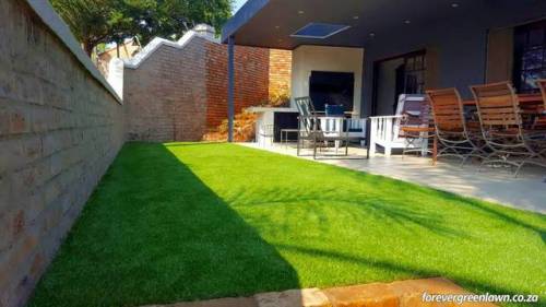 Client garden with artificial lawn in Waterkloof, Pretoria, South Africa – transformed into a mainte